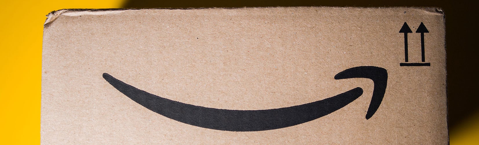 Amazon logo on cardboard box