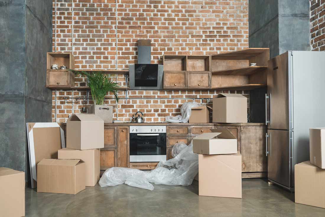 Pile of boxes inside rustic design kitchen