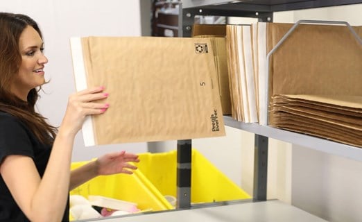 evertec mailers are being organized in a shelf