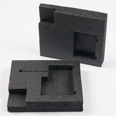 Black engineered molded foam for product protection.