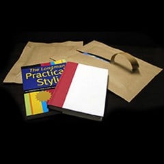 Cohesive material protection used to package books.