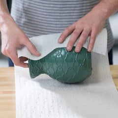 PP foam is used as a protective wrap for a green ceramic vase.