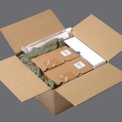 Paper packaging material is used for void fill to protect products inside a box package.