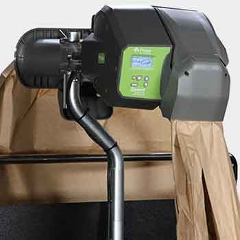 Image of a Pregis Quantum Pro paper void-fill machine dispensing crumpled brown paper for protective packaging during shipping.