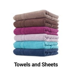 a stack of towels and sheets