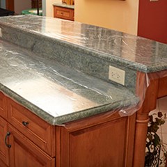 Protective film is used on a set of kitchen countertops.