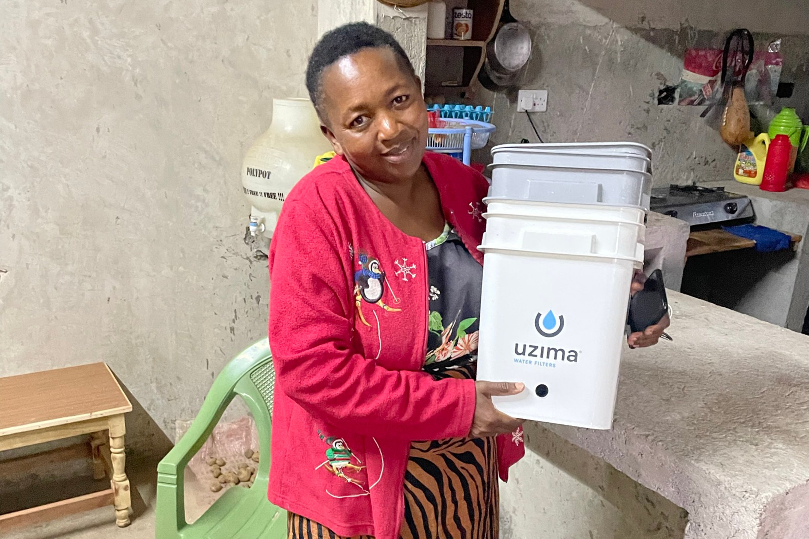 Josephine from Nakuru, West Central Kenya poses with her Uzima UZ-2.