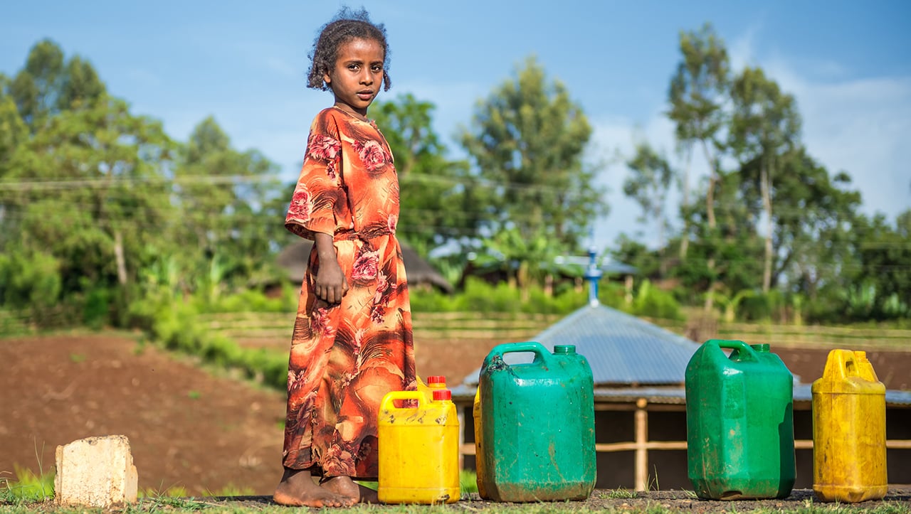 girl with water containers