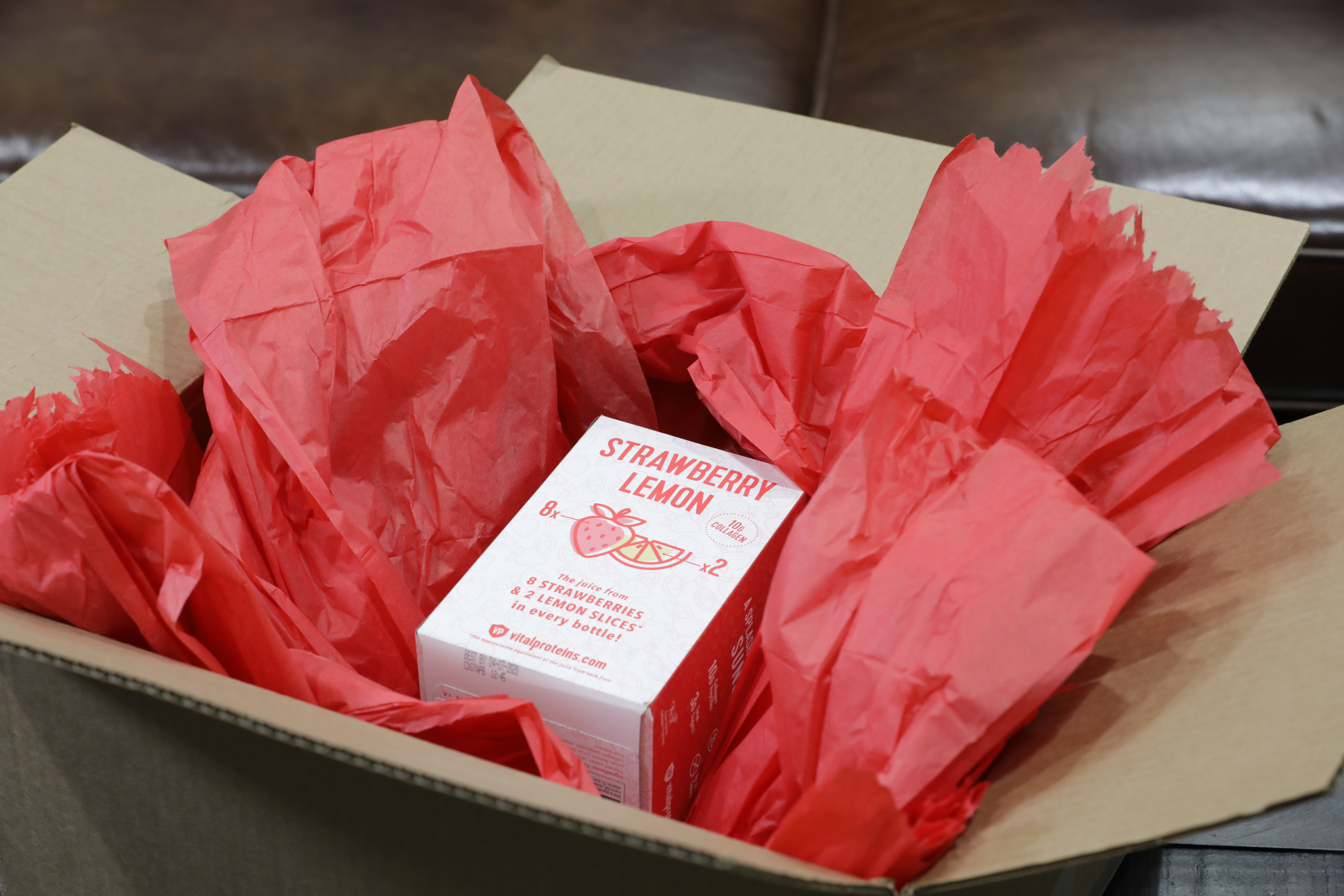 Red Inspyre paper packaging inside box