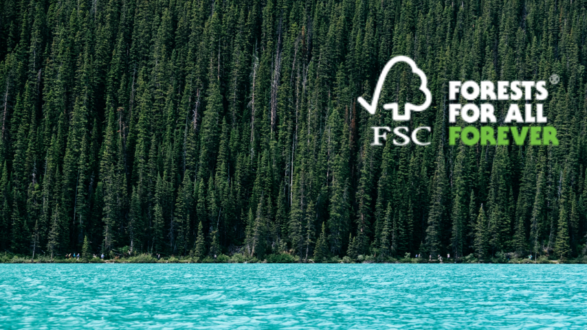 FSC logo in front of lake with pine tree forest.